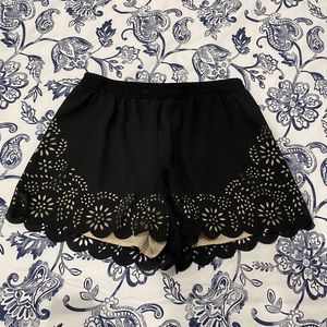 NWOT Shorts with stamped out design. Sz small